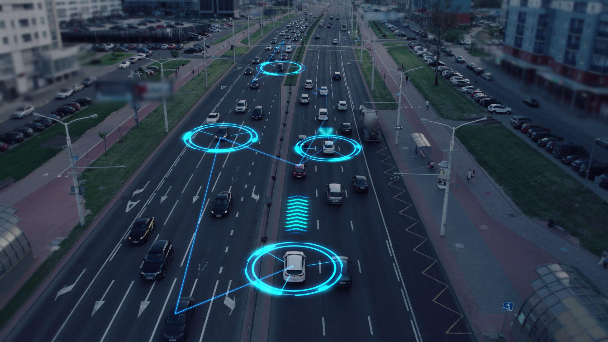 Visualization of the interaction of self-driving autonomous vehicles. Robotic cars are controlled by AI, driving along a busy city avenue, scanning the road with sensors, exchanging information.