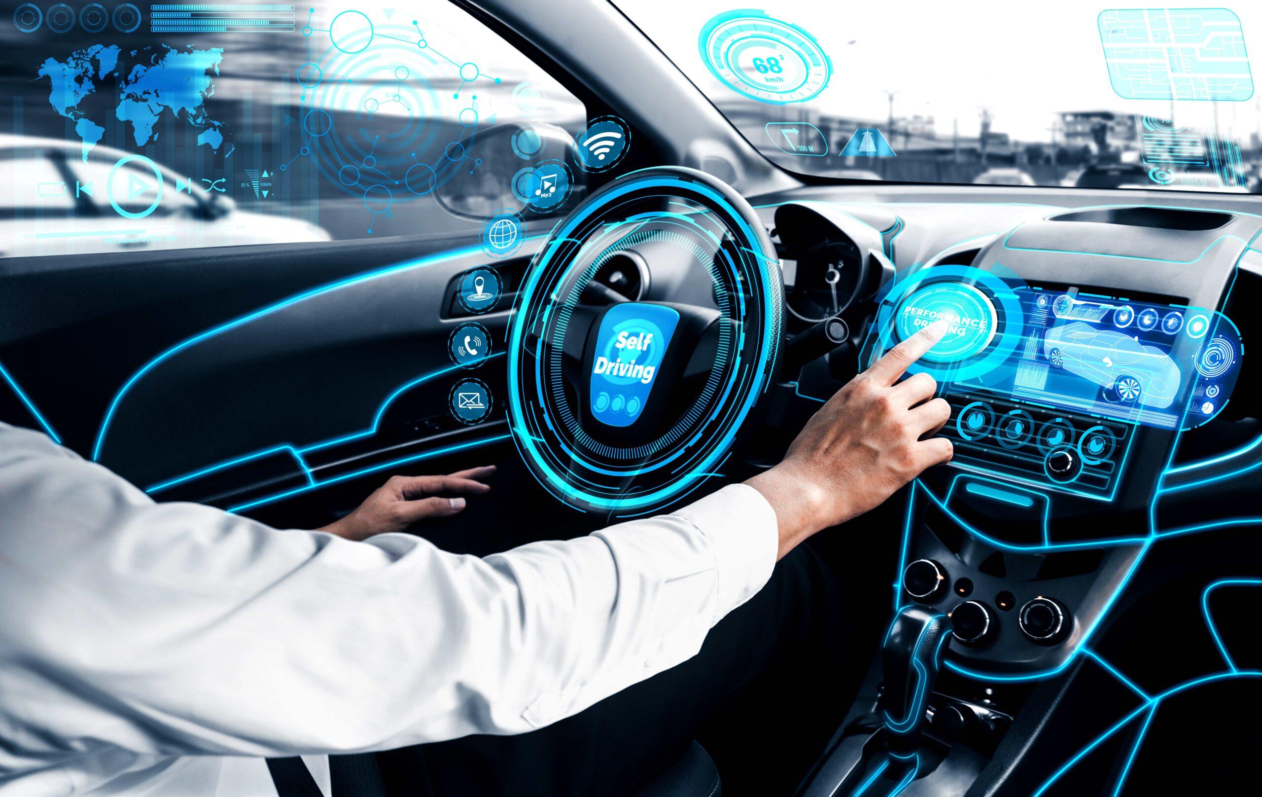 Self-driving autonomous car with relaxed young man sitting at driver seat is driving on busy highway road in the city. Concept of machine learning, artificial intelligence and augmented reality.